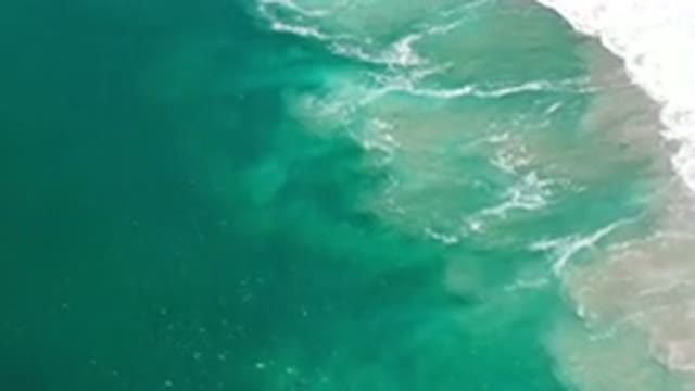 LOS CABOS MEXICO-2020: Beautiful Deeply Blue Water Sea Waves Slowly Crashing At