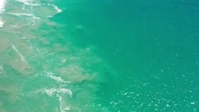 LOS CABOS MEXICO-2020: Small Waves Forming In A Lake Or Sea With Beautiful Green