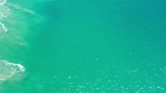 LOS CABOS MEXICO-2020: Aerial View Of A Calm Sea Green Ocean With Crystal Clear