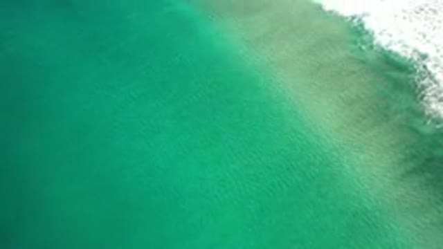 LOS CABOS MEXICO-2020: Aerial Video Of A White Sand Beach With Green Water During
