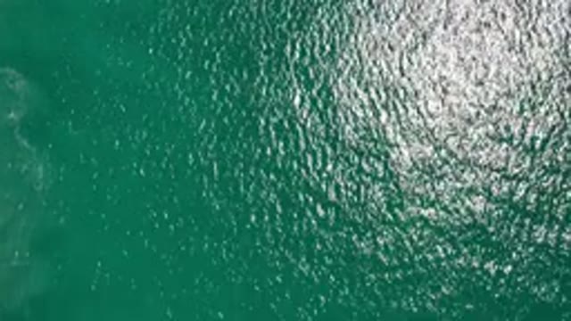 LOS CABOS MEXICO-2020: Glistening Simmering Aqua Ocean Water Breathtakingly