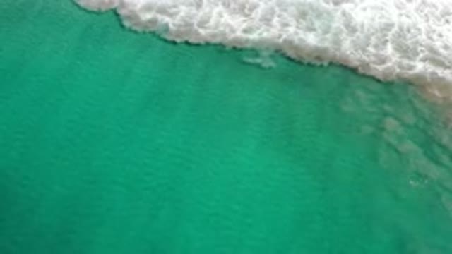 LOS CABOS MEXICO-2020: Deep Green Sea Water And A Wild White Bubble Wave Moving