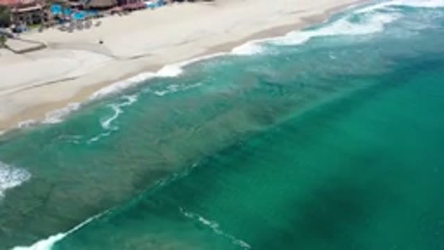 LOS CABOS MEXICO-2020: Gorgeous Deeply Navy Blue Sea Water in a Beach with Waves