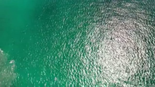 LOS CABOS MEXICO-2020: Light Scattering Over The Surface Of The Blue Green Sea