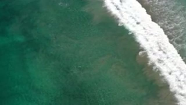 LOS CABOS MEXICO-2020: Sea Waves Crash On The Beach And Make Lots Of Foam
