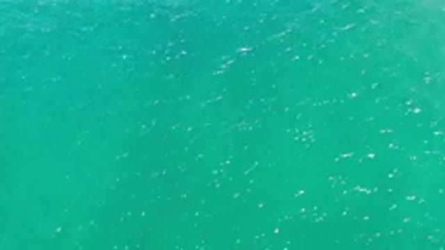 LOS CABOS MEXICO-2020: Beautiful Light Blue Shiny Waters In The Ocean With Reflections