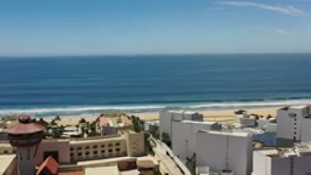 LOS CABOS MEXICO-2020: A Beautiful View Of Deep Blue Sea And A Beach Over The