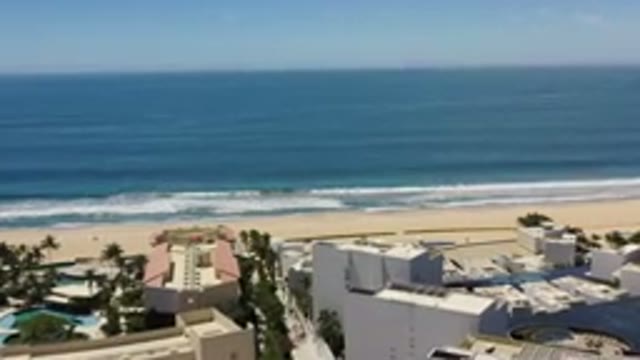 LOS CABOS MEXICO-2020: Aerial View of Beach Town with Waves Crashing