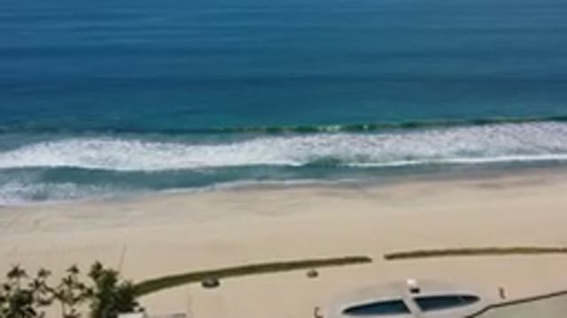 LOS CABOS MEXICO-2020: Brilliant Blue Ocean With Huge White Wave Crashing Into Shoreline