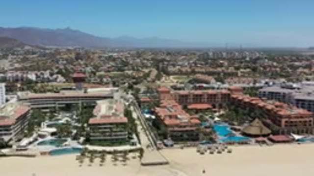 LOS CABOS MEXICO-2020: Beachside Aerial View of Condominiums, Hotels, and Pools