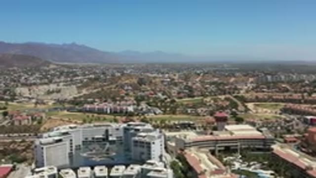 LOS CABOS MEXICO-2020: Aerial View Of Town With Buildings Cars Roads
