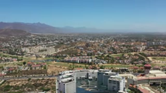 LOS CABOS MEXICO-2020: A View Of The City With Buildings Roads Trees And Scenic Landscape