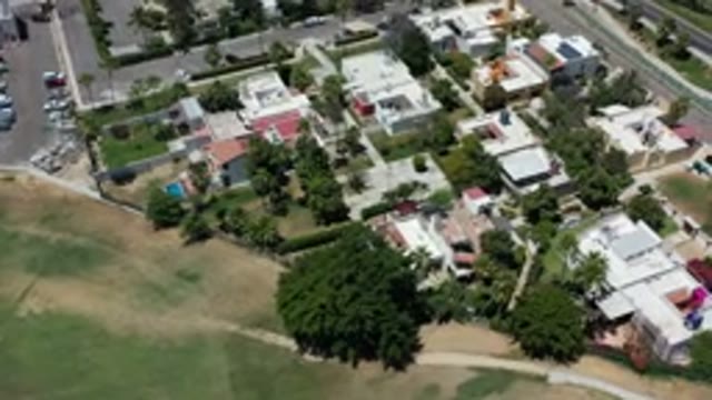 LOS CABOS MEXICO-2020: A View Of An Estate From The Sky With Some Trees And