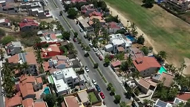 LOS CABOS MEXICO-2020: Top View Of A City With Buildings And Roads And