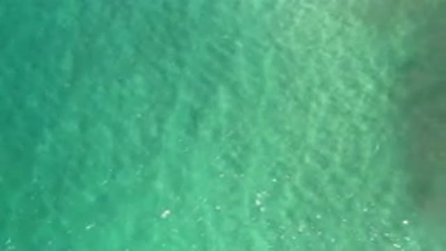 LOS CABOS MEXICO-2020: Ripples Gently Cascading Across Crystal Clear Aquamarine