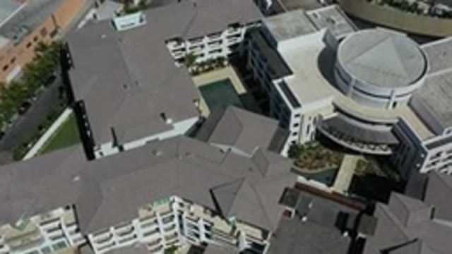 LOS CABOS MEXICO-2020: Aerial View Of City With Buildings Cars And Roads