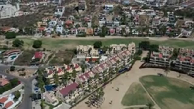 LOS CABOS MEXICO-2020: Flying Towards An Affluent Hillside Community On A Sunny