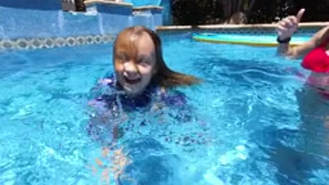 LOS CABOS MEXICO-2020: A Child Goes Underwater And Resurfaces While Swimming In