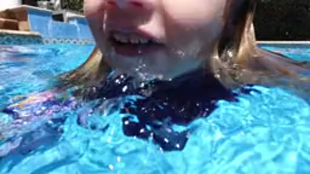 LOS CABOS MEXICO-2020: Cute Little Blonde Girl And Her Family Have Fun In Their Pool