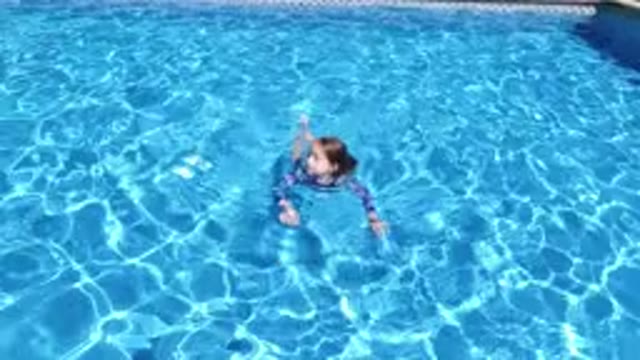 LOS CABOS MEXICO-2020: A Kid Is Swimming And Having Fun In A Pool