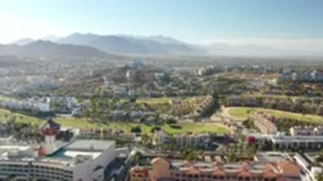 LOS CABOS MEXICO-2020: Bird's Eye View Of A City And A Mountain Peak Backdrop In
