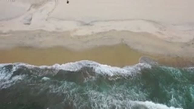 LOS CABOS MEXICO-2020: Top Side View Of A Powerful Wave Towards A Wide Sand Beach
