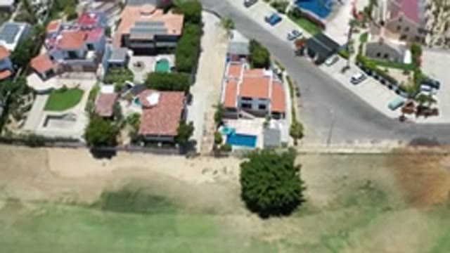LOS CABOS MEXICO-2020: Top View Of The Buildings Trees Greenery Vehicles Condo