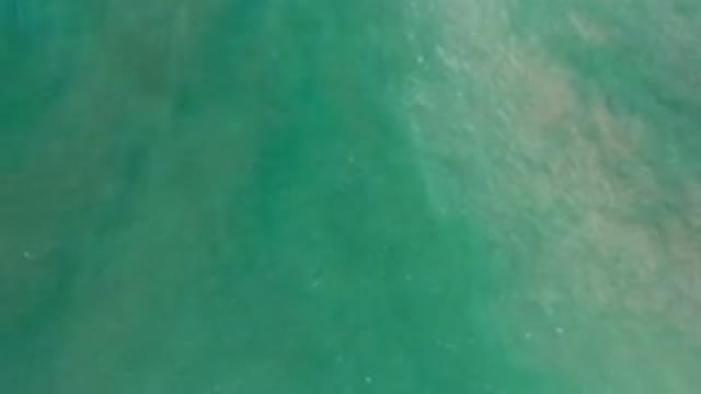 LOS CABOS MEXICO-2020: Aerial View of Waves Moving in a Green Ocean