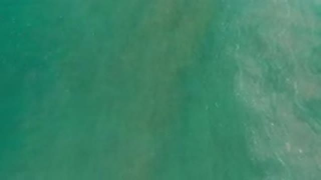 LOS CABOS MEXICO-2020: Top View Of Deep Green Sea Water With Light Waves