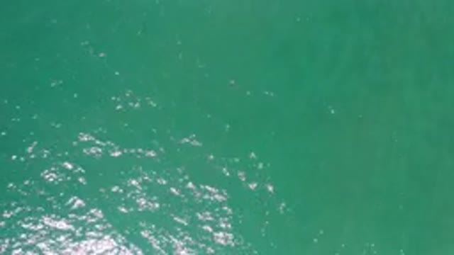 LOS CABOS MEXICO-2020: Clear Deep Blue Ocean Water Moving Calmly Away From Me