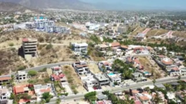 LOS CABOS MEXICO-2020: Aerial View Of Buildings And Roads Leading Further Into