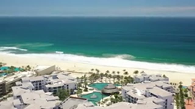 LOS CABOS MEXICO-2020: A View Of A Resort On The Edge Of The Beach And Ocean