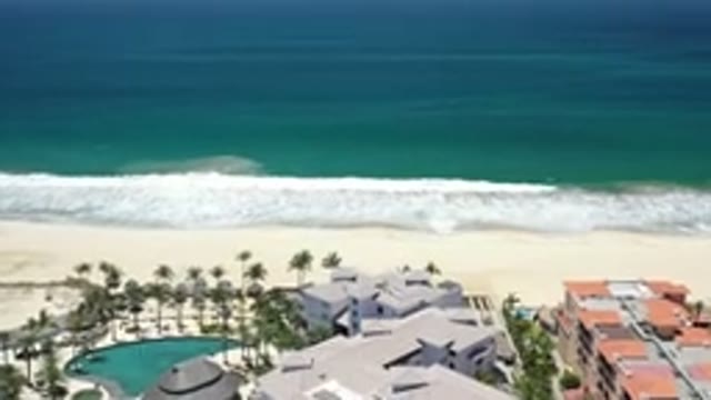 LOS CABOS MEXICO-2020: Overhead Shot Of A Resort Area Moving Toward An Empty Shoreline