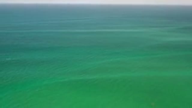 LOS CABOS MEXICO-2020: A Top Wide View Of A Calm Deep And Green Sea Surface