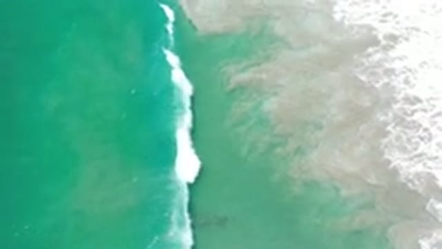 LOS CABOS MEXICO-2020: Deep And Green Sea With Strong White Bubbled Wave Towards Shore