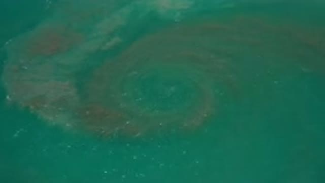 LOS CABOS MEXICO-2020: Big Aqua Ocean Forms Big Black Scary Tornado Whirlpool