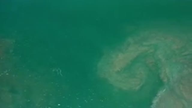 LOS CABOS MEXICO-2020: Sea Waves Crashing Into A Rock Viewed From The Air