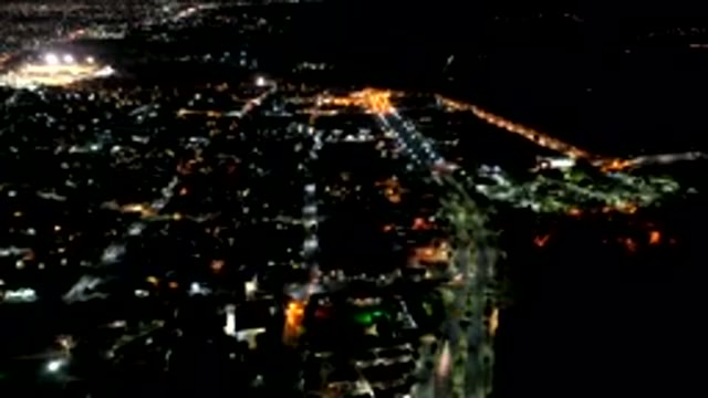 LOS CABOS MEXICO-2019: Aerial View of Big City by Night from the Sky