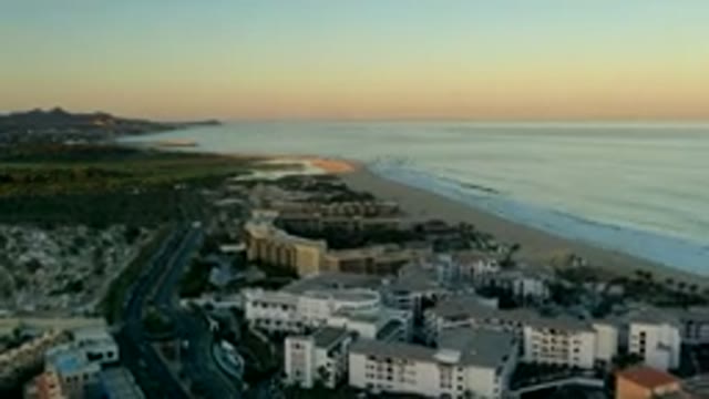 LOS CABOS MEXICO-2019: Topside View Of A Beautiful Beach And A Town With Large Buildings