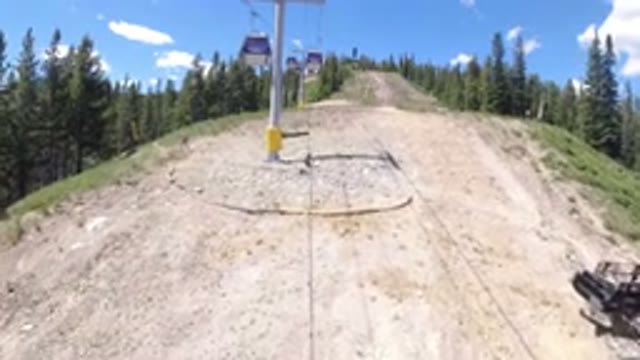 WINTER PARK COLORADO-2019: A Beautiful Ropeway Cabin View Of A Hilltop And Other Cabins