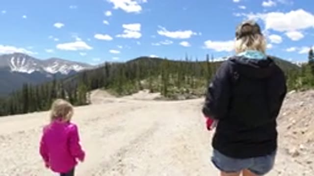 WINTER PARK COLORADO-2019: Family Activity Of Hiking Along The Mountain Road