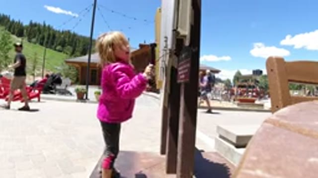 WINTER PARK COLORADO-2019: A Kid Playing With A Board In The Snow