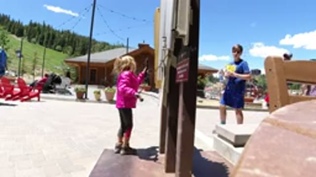WINTER PARK COLORADO-2019: A Little Girl Is Enjoying Herself Playing Outside On