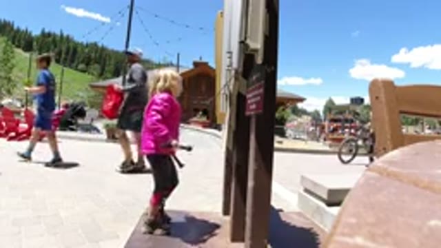 WINTER PARK COLORADO-2019: Little Girl Tests A Large Interactive Xylophone