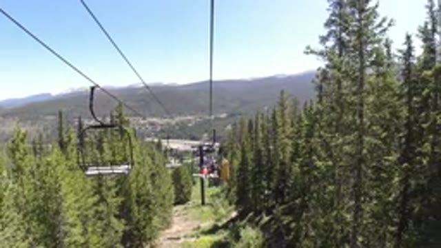 WINTER PARK COLORADO-2019: Ski Lift Ascending Mountain During Off-Season
