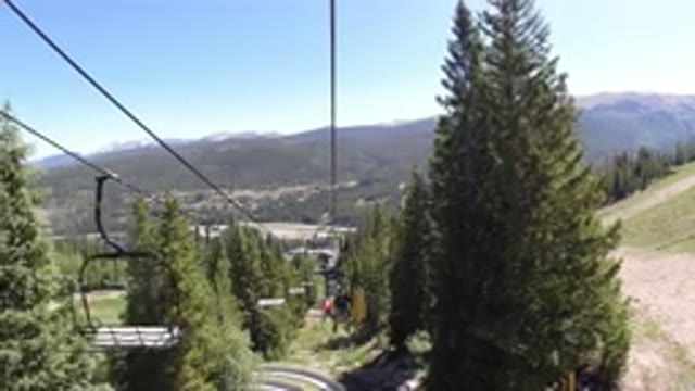WINTER PARK COLORADO-2019: Snow Lift in Summer Surrounded by Green Trees