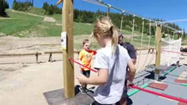 WINTER PARK COLORADO-2019: A Little Girl Walking On A Rope And Finally Step Out