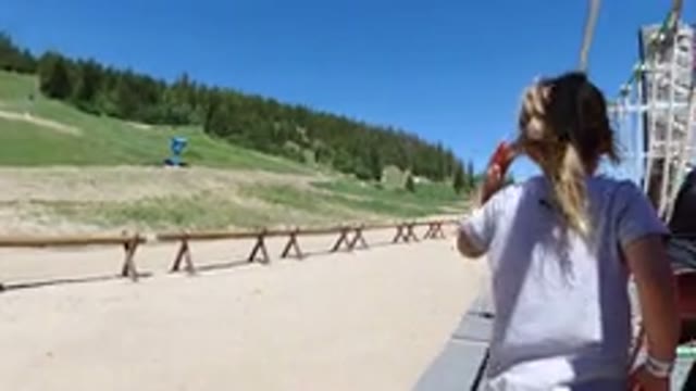 WINTER PARK COLORADO-2019: A Little Girl Walking On A Rope In A Park