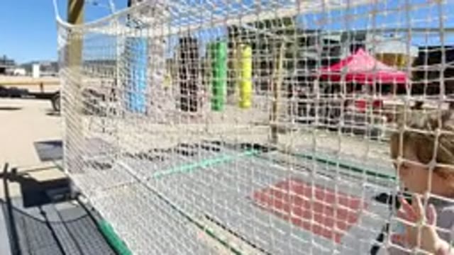 WINTER PARK COLORADO-2019: Young Blonde Girl Inside A White-Netted Play Area