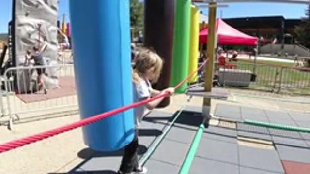 WINTER PARK COLORADO-2019: Child On An Assault Course Dodging Obstacles On A Tightrope